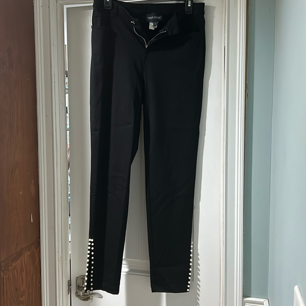 Frank Lyman black slacks with pearls on both side slits.   Never worn.  Size M/M